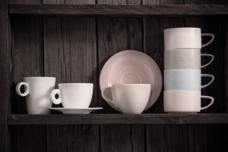 kitchen dishware on old dark wooden backgroundの写真素材