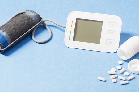 modern tonometer on blue  backgroundの写真素材