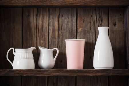 kitchen dishware on old dark wooden backgroundの写真素材