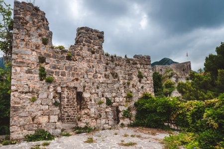 Ancient stone ruins and fortress wall in Old Bar town, Montenegro. Stari Bar - ruined medieval city on Adriatic coast, Unesco World Heritage Site.の写真素材