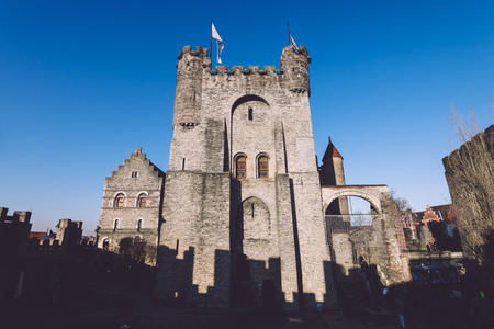 Ghent, Flanders, Belgium - December 30th, 2016. Gravensteen - historical medieval castle in flemish capital Gent. Castle of Counts stronghold by golde hour.のeditorial素材