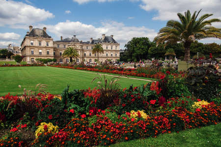 Paris, France - August 13, 2017. View of Luxembourg gardens and Luxembourg Palace, now is home to French Senate. Popular parisian landmark and famous public park with historic building and flowerbed.のeditorial素材