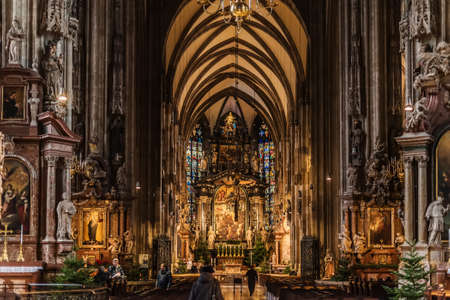 Vienna, Austria - December 21, 2017. Saint Stephen's Cathedral christmas interior with xmas trees and candles. Interior view of Stephansdom - symbol of Vienna and Austria's popular landmark.のeditorial素材