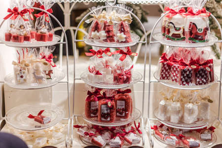 Vienna, Austria - December 24, 2017. Kiosk with candy buffet at Viennese Christmas Market. Close view of Xmas fair stall selling sweets.のeditorial素材