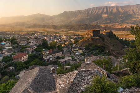 Gjirokastra City and Castle on Hill against Mountains