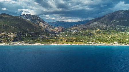 Aerial Drone Landscape of Borsh Beach and Mountainsの写真素材