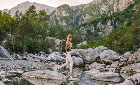 Active Woman Hiking in Albanian Alps