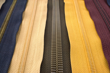 five varicoloured clasps for clothの写真素材