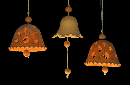 Original clay handbells of a manual moulding with an individual pattern の写真素材