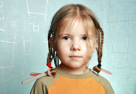 The girl  the curled hair.Care of beauty since childhood  の写真素材