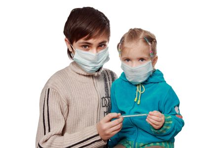 The ill children in respirators consider the medical thermometer  の写真素材