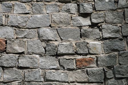 Background - the wall which has been laid out from greater stones  の写真素材