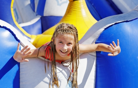 Vacation  Happy girl on carousel の写真素材