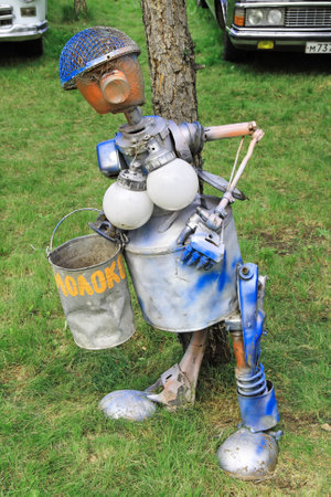 The figure of a Busty milkmaid made of garbage and scrap metalのeditorial素材