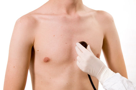 doctor listens to the rhythm of the heart