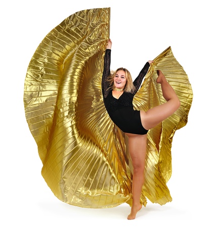 Dancer with golden wings on a white background.Oriental dance.Plastic arts of human body.の写真素材