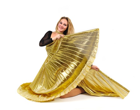 Dancer with golden wings on a white background.Oriental dance.Plastic arts of human body.
の写真素材