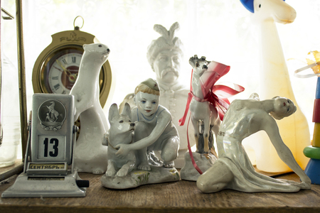 A girl with a dog, a ballerina, a weasel, a bust. Old country house. A girl with a dog, a ballerina, a weasel, a bust. Old country house. The calendar date is "September 13 Monday"の写真素材