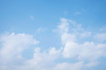 blue sky with cloud closeup. blue sky abstract and fluffy white cloud during the daytime in Thailand.の写真素材