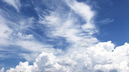 Bright blue sky and cloudy in panorama view for graphic design or wallpaper. Natural background in...
