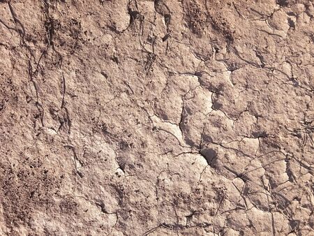 The ground has cracks in the top view for the background or graphic design with the concept of...