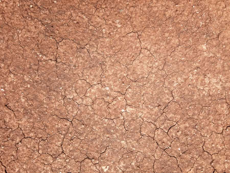 The ground has cracks in the top view for the background or graphic design with the concept of...