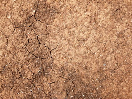 The ground has cracks in the top view for the background or graphic design with the concept of...