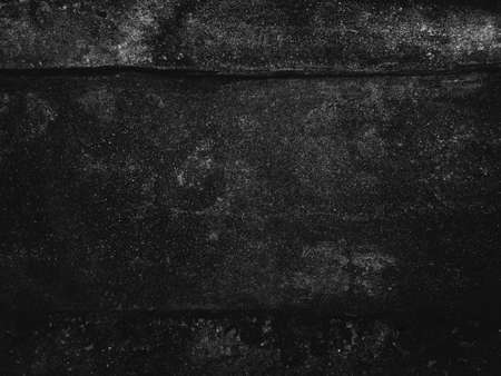 Dark cement wall background in vintage style for graphic design or wallpaper. The pattern of the concrete floor is aged in a retro concept.の写真素材