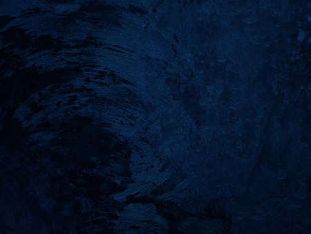 Dark rough cement wall background for graphic design or wallpaper. Grungy black and blue concrete...