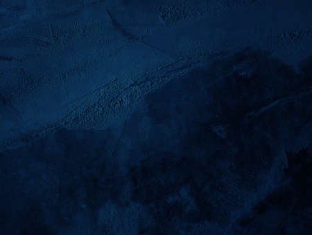 Dark rough cement wall background for graphic design or wallpaper. Grungy black and blue concrete...