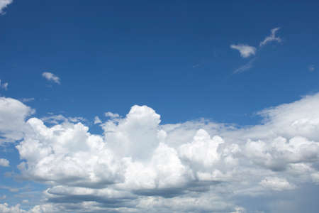 Bright blue sky with white clouds for background or wallpapers.The beauty of tropical nature for...