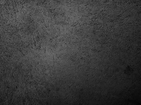 Dark cement wall background in vintage style for graphic design or wallpaper. The pattern of the concrete floor is aged in a retro concept.の写真素材