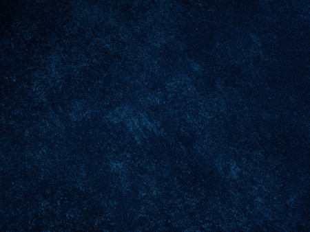 Dark rough cement wall background for graphic design or wallpaper. Grungy black and blue concrete texture in vintage style. The old plaster floor has a mysterious and terrifying age.の写真素材