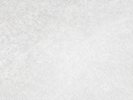 White cement wall background in vintage style for graphic design or wallpaper. Pattern of soft concrete floor in retro concept.の写真素材