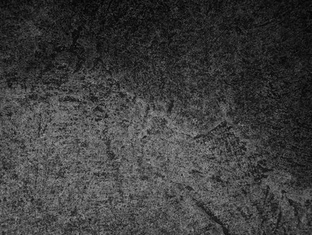Dark cement wall background in vintage style for graphic design or wallpaper. The pattern of the concrete floor is aged in a retro concept.の写真素材