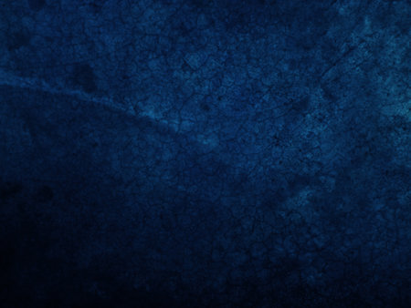 Dark rough cement wall background for graphic design or wallpaper. Grungy black and blue concrete texture in vintage style. The old plaster floor has a mysterious and terrifying age.の写真素材