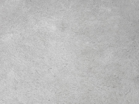 Cement wall background, not painted in vintage style for graphic design or retro wallpaperの写真素材