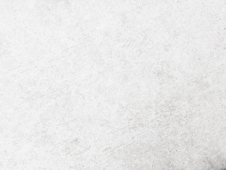 White cement wall background in vintage style for graphic design or wallpaper. Pattern of soft concrete floor in retro concept.の写真素材