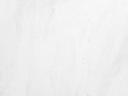 White concrete wall background in vintage style for graphic design or wallpaper. Pattern of soft cement floor in retro concept. Gray abstract texture detail in construction.の写真素材