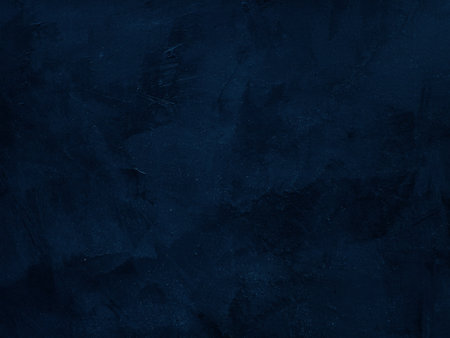 Dark rough cement wall background for graphic design or wallpaper. Grungy black and blue concrete texture in vintage style. The old plaster floor has a mysterious and terrifying age.の写真素材