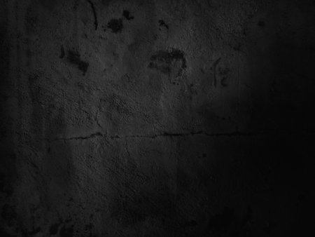 Dark cement wall background in vintage style for graphic design or wallpaper. The pattern of the concrete floor is aged in a retro concept.の写真素材