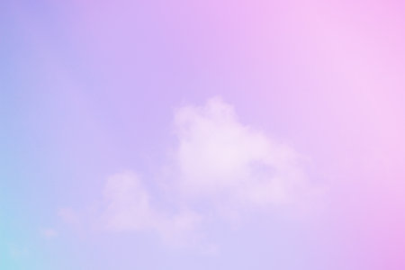 Sky and clouds in pastel tones. Colorful natural background for graphic design or wallpaper in the romantic love conceptの写真素材
