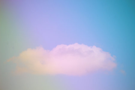Beautiful sky and clouds in pastel tones. Fluffy soft background in vintage style for graphic design...