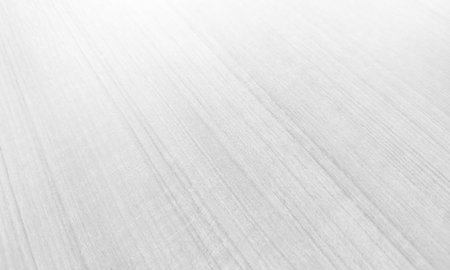 White wooden floor with a beautiful texture. Nature background in vintage style for graphics design or wallpaper. Abstract pattern of the table top view. Details of surfaces for interior decoration.の写真素材