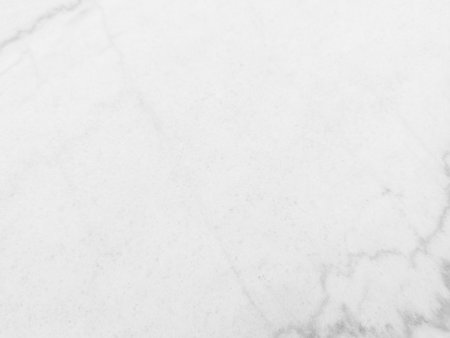 White marble background in vintage style for graphic design or wallpaper. Natural material surfaces used in construction and decoration inside buildings. Pattern of soft texture in retro concept.の写真素材