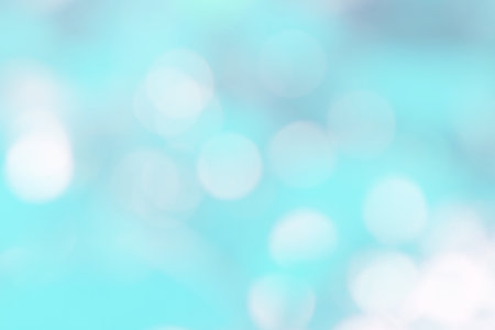Blur light blue bokeh nature background in abstract style for graphic design or wallpapers. Natural...