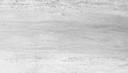 White wooden background with a beautiful texture in vintage style for graphics design or wallpaper. Abstract pattern of the table top view. Details of surfaces and props for interior decoration.の写真素材