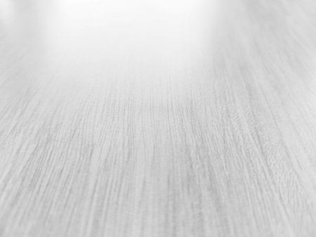 White wooden background with a beautiful texture in vintage style for graphics design or wallpaper. Abstract pattern of the table top view. Details of surfaces and props for interior decoration.の写真素材