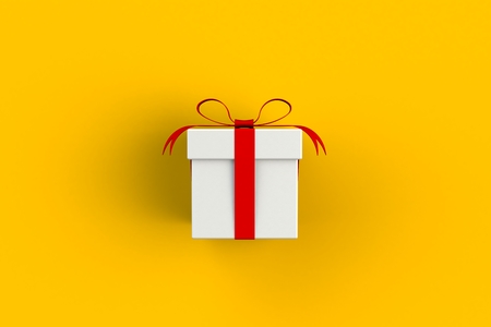 Christmas and New Year's Day ,red white gift box isolated on yellow background, 3D renderingの写真素材