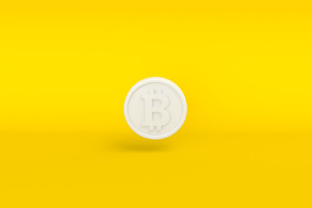 White bitcoin cryptocurrency on yellow background. 3d illustrationの写真素材